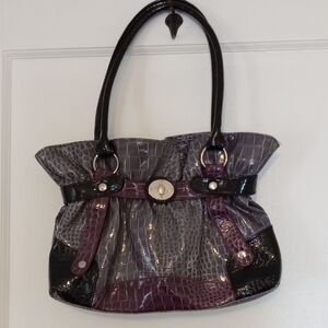 Elegant Black and Purple Shoulder Bag with Luxe Texture